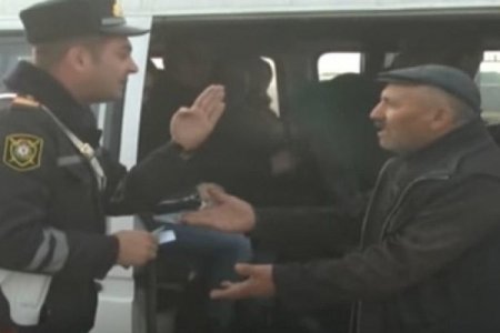 Sumqayıtda polislə sürücü arasında GƏRGİN ANLAR: "Camaatın 6 balası birdən öldü" - VİDEO